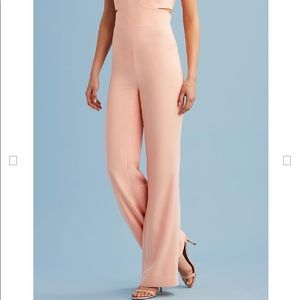 Crêpe jumpsuit ..cut out detail at side waist.